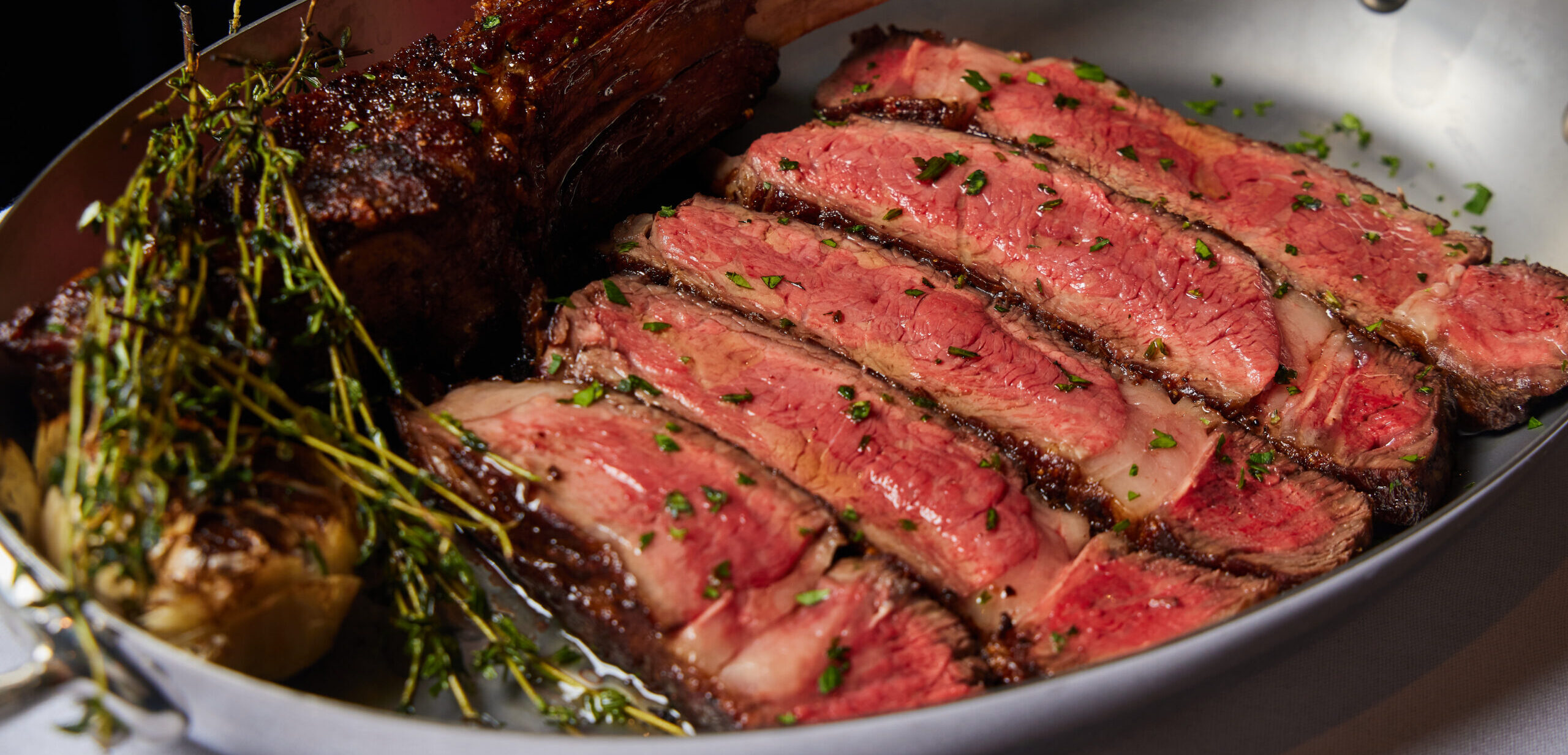 cooked steak in bowl
